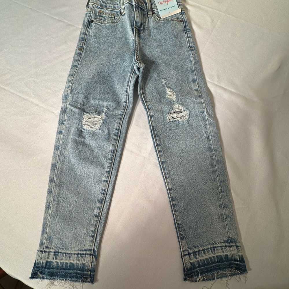 Distressed Light Blue Jeans
